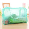 Trousse de toilette transparente fleurs