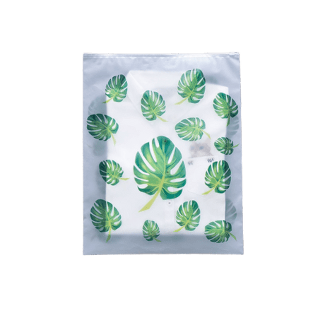 Trousse de toilette transparente feuille verte